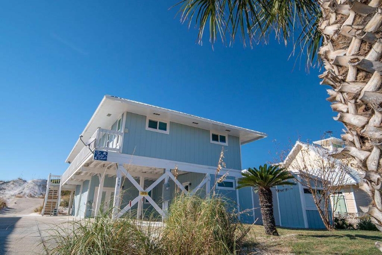 Find Tranquility + Convenience at this First Tier Cape Home