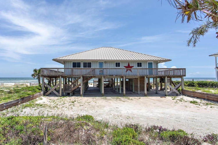 Pure Paradise at this Gulf Front Coastal Cottage on One Acre